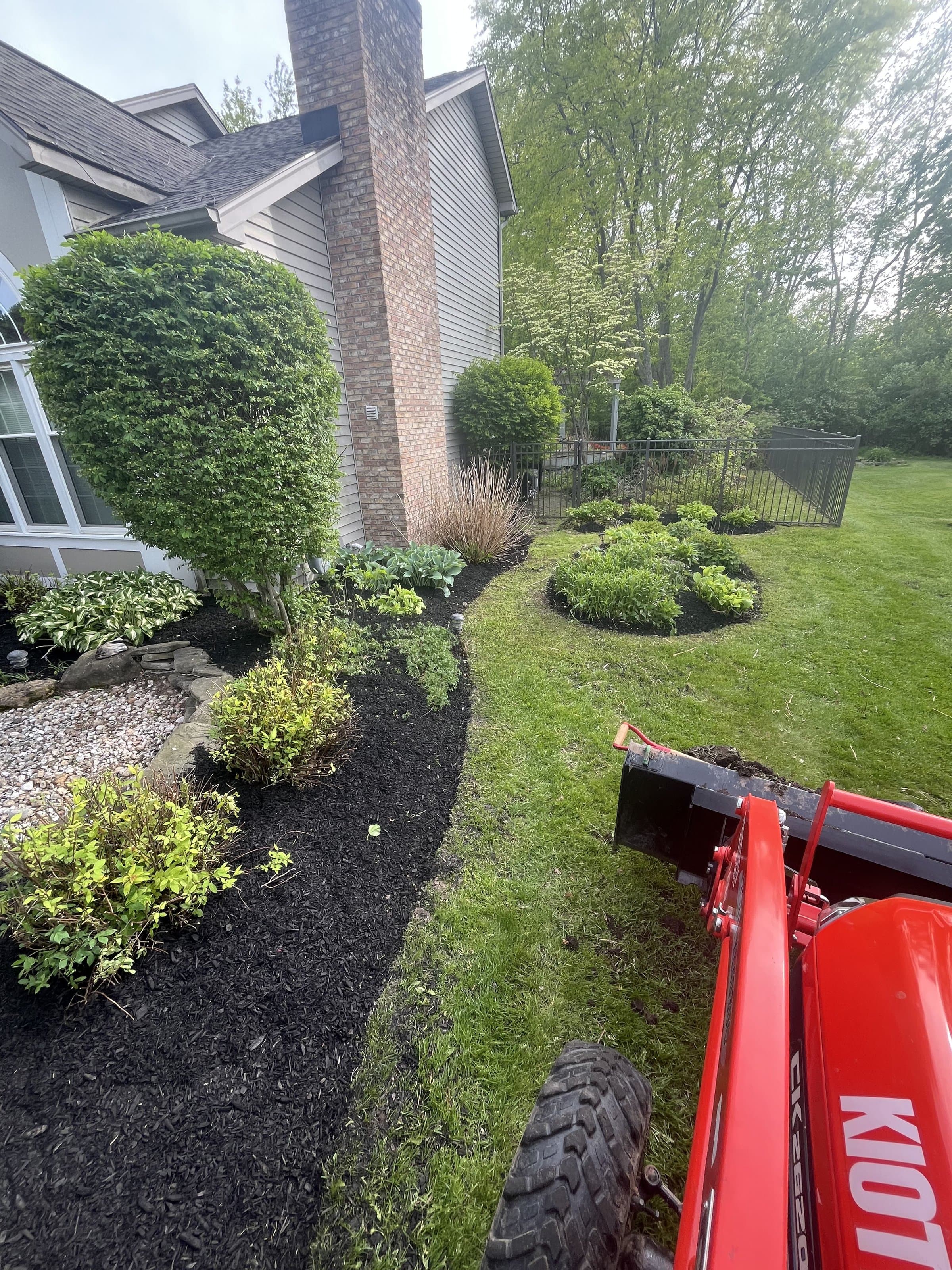Mulch bed refresh